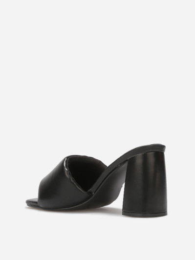 Mules à talon et bride rembourrée