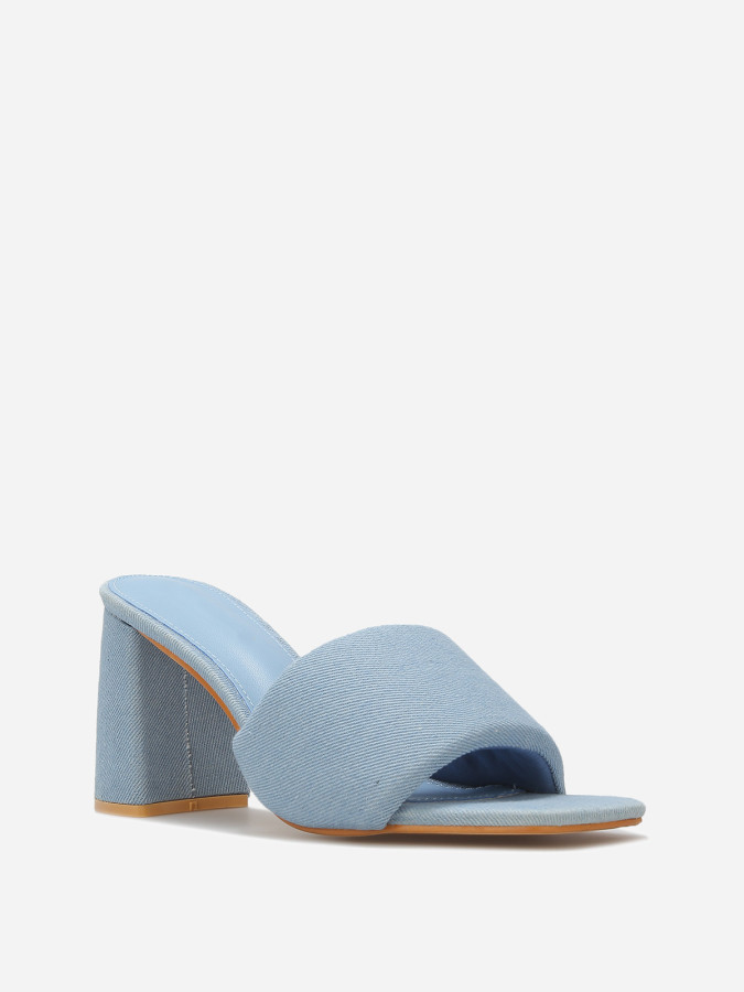 Mules à talon et bride rembourrée