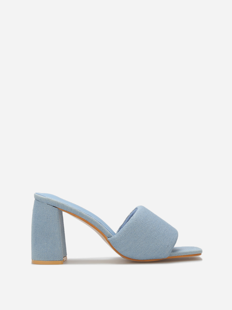 Mules à talon et bride rembourrée