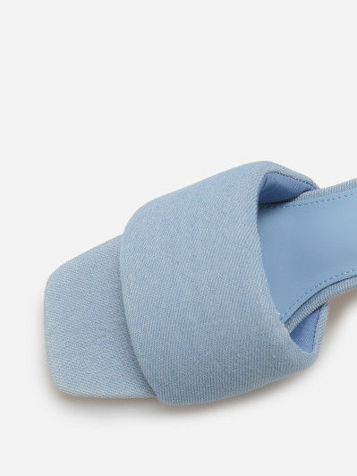 Mules à talon et bride rembourrée