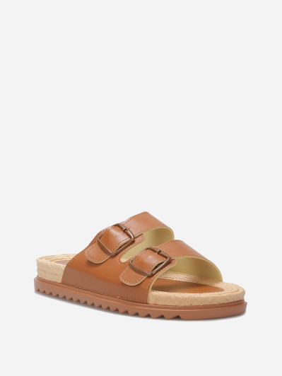 Mules à boucles et semelle dentelée