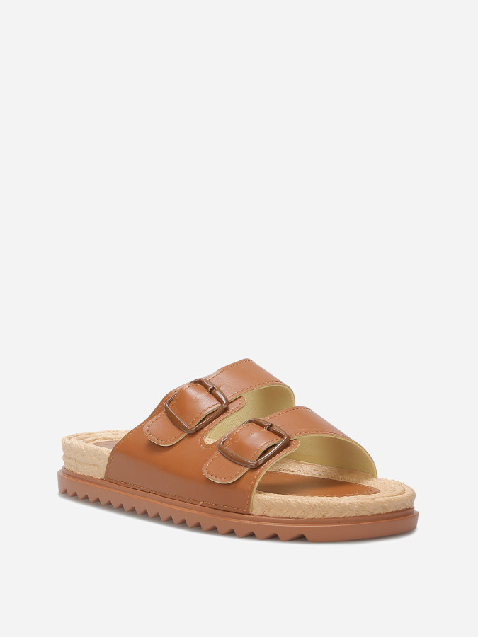 Mules à boucles et semelle dentelée