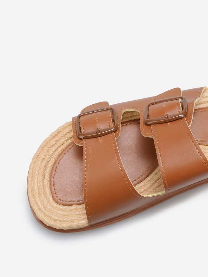 Mules à boucles et semelle dentelée