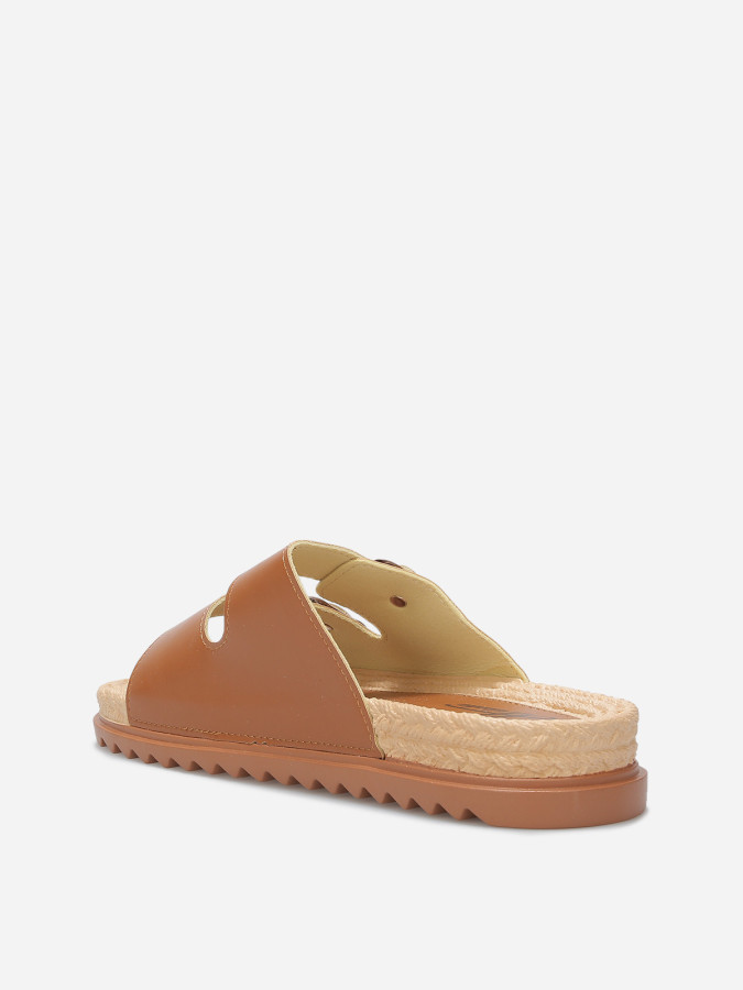 Mules à boucles et semelle dentelée