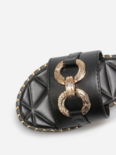 Mules plates à boucle et clous dorés