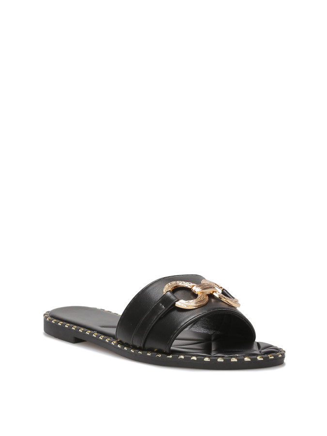 Mules plates à boucle et clous dorés