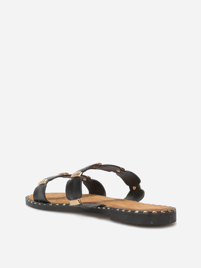 Mules à brides festonnées et détails dorés