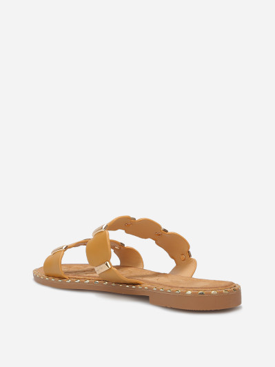 Mules à brides festonnées et détails dorés