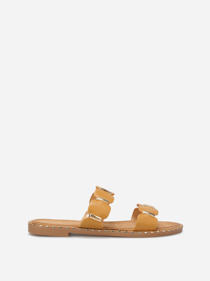 Mules à brides festonnées et détails dorés