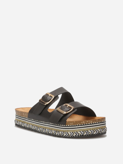 Mules à boucles et plateforme ethnique