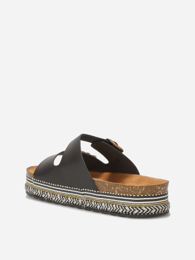 Mules à boucles et plateforme ethnique