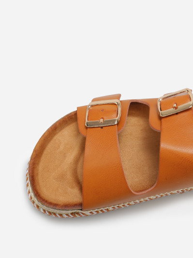 Mules à boucles et plateforme ethnique