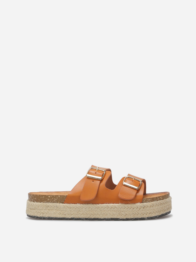 Mules à boucles et plateforme