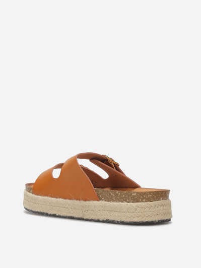 Mules à boucles et plateforme