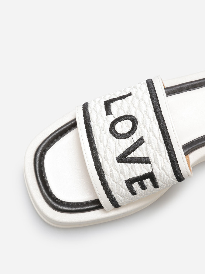 Mules "Love" avec plateforme