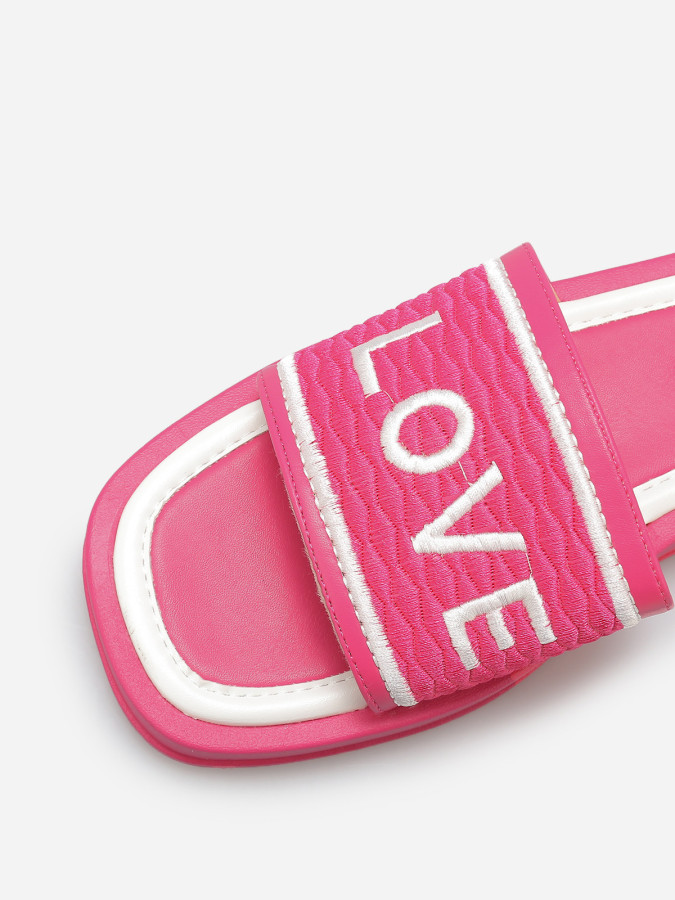 Mules "Love" avec plateforme