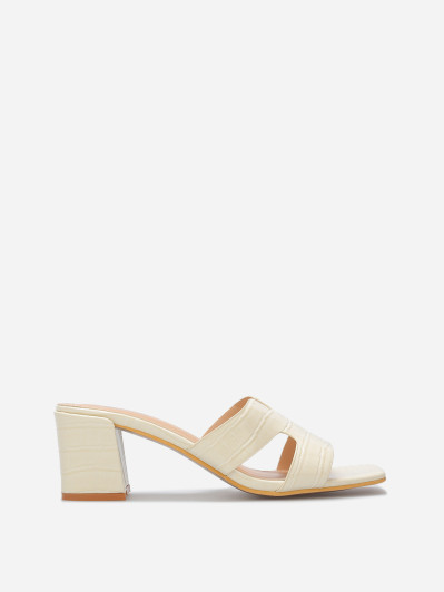 Mules ajourées à talon carré