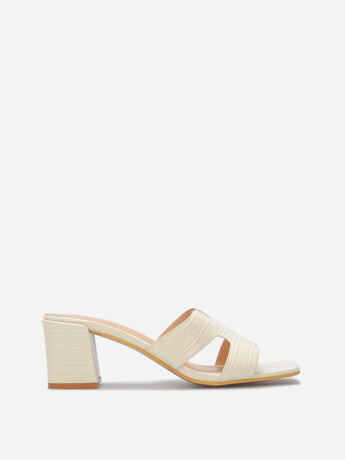 Mules ajourées à talon carré