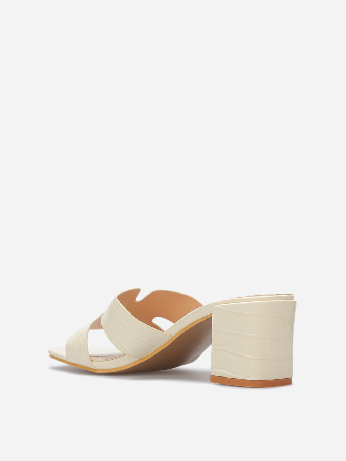 Mules ajourées à talon carré