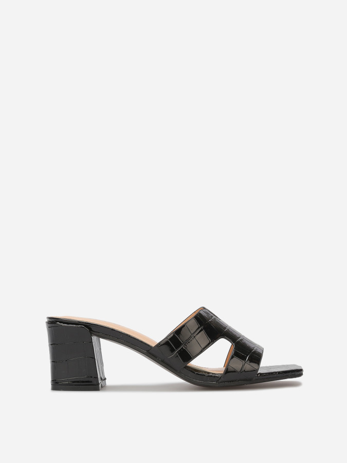 Mules ajourées à talon carré