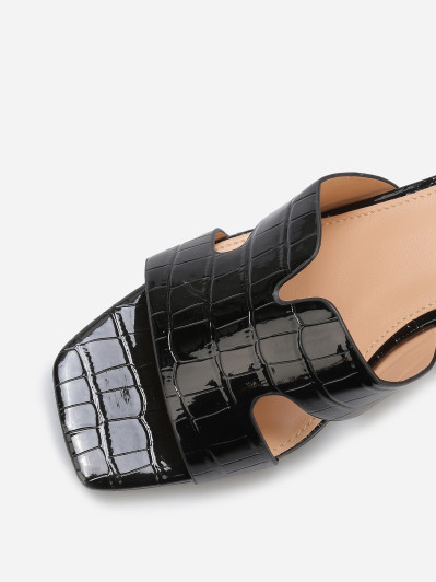 Mules ajourées à talon carré