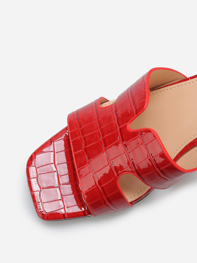 Mules ajourées à talon carré