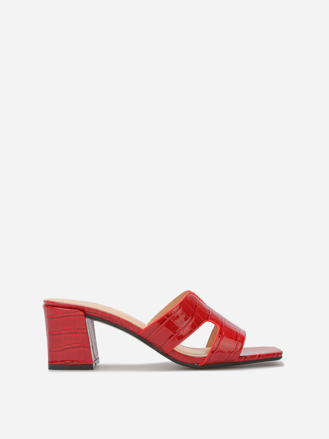 Mules ajourées à talon carré