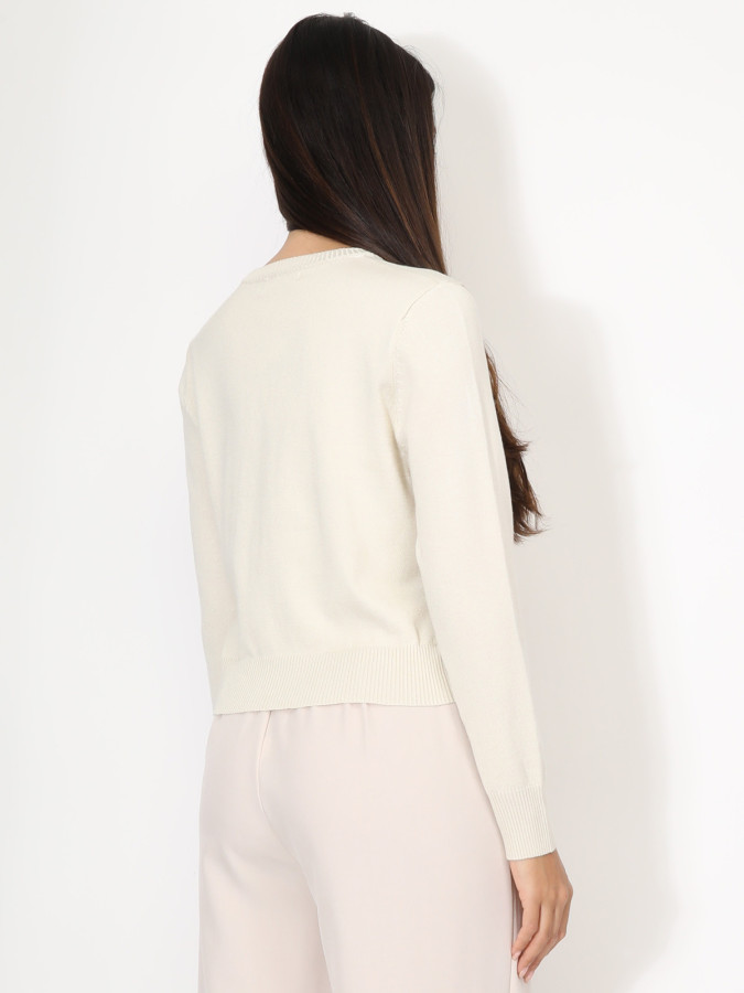 Cardigan beige à col rond et boutons