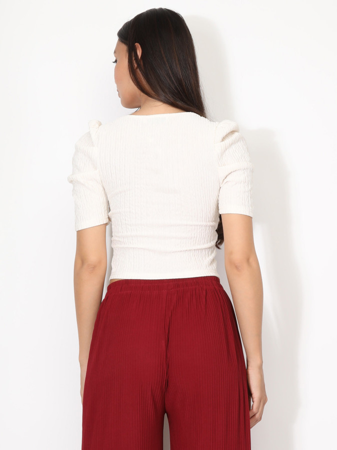 Top zippé à manches gigot