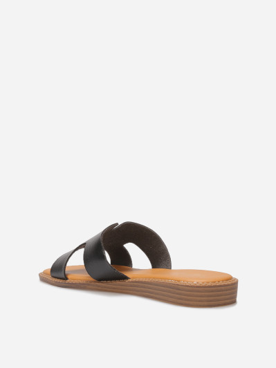 Mules compensées à bride ajourée