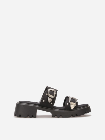 Mules à boucles et clous argentés