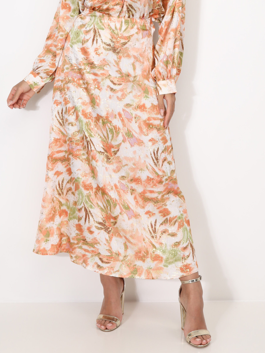 Jupe à motifs et éclats dorés