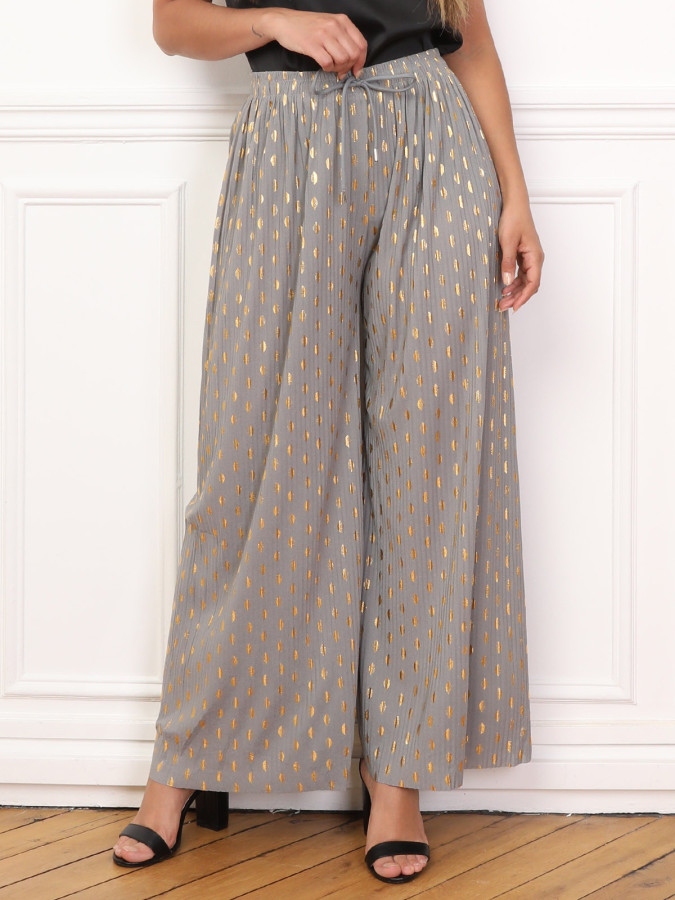 Pantalon fluide à tâches dorées