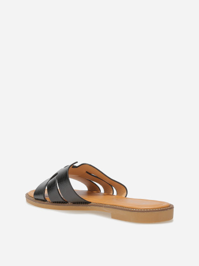 Mules plates à brides texturées et entrecroisées