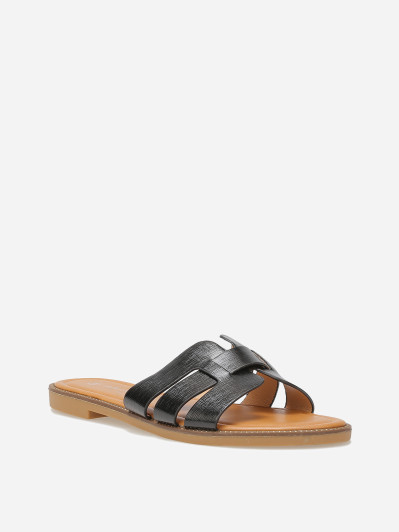 Mules plates à brides texturées et entrecroisées