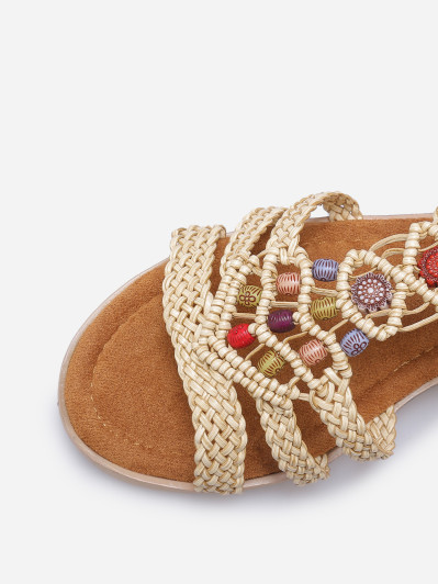 Sandales compensées à brides tressées