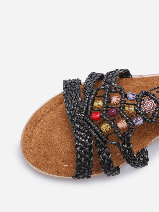 Sandales compensées à brides tressées