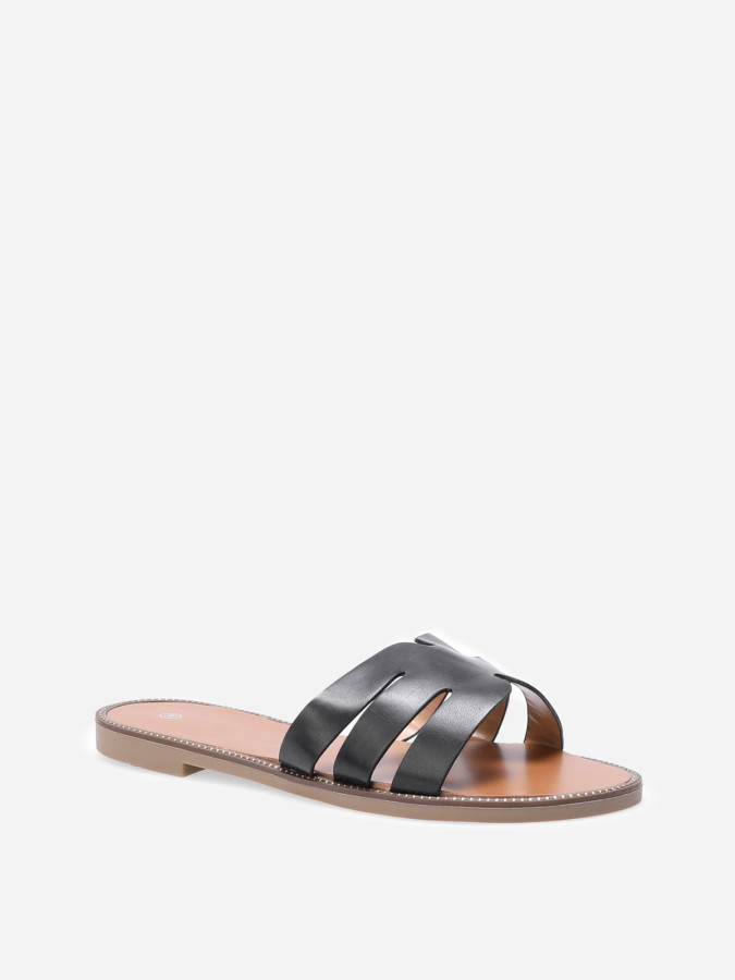 Mules plates à bride ajourée et clous