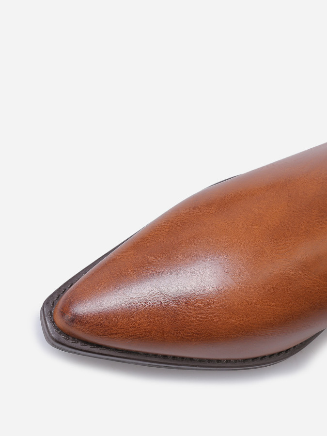 Bottines à bride cloutées et nouée