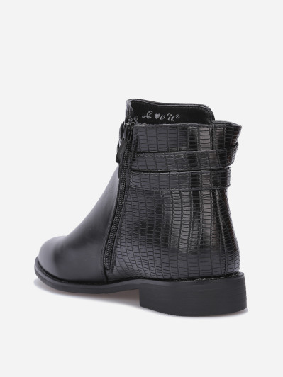 Bottines texturées avec bride à boucle