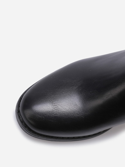 Bottines texturées avec bride à boucle