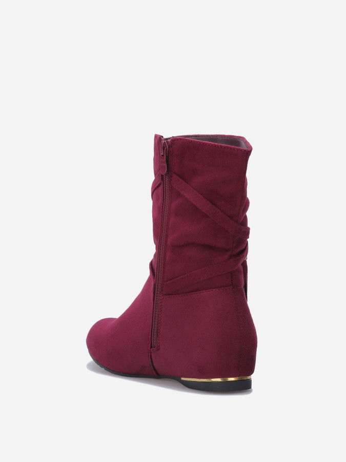 Bottines plissées et compensées à pampilles