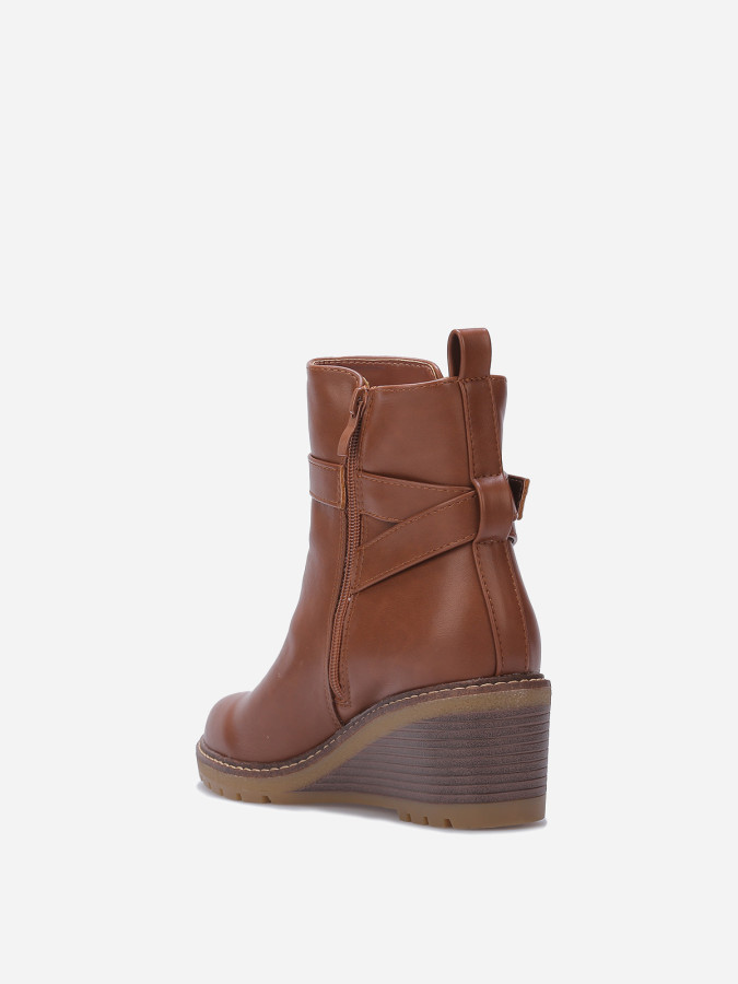 Bottines compensées à boucle