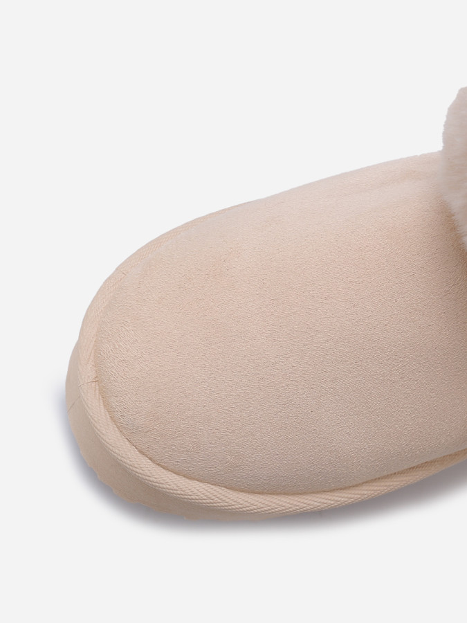 Boots fourrées à plateforme et nœud