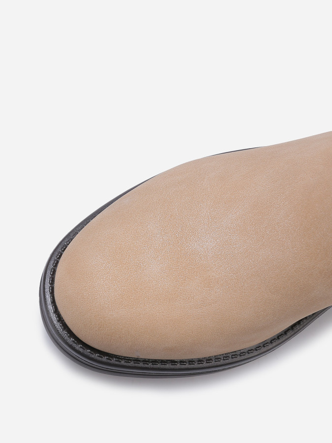 Bottines à effet mat pailleté avec boucles