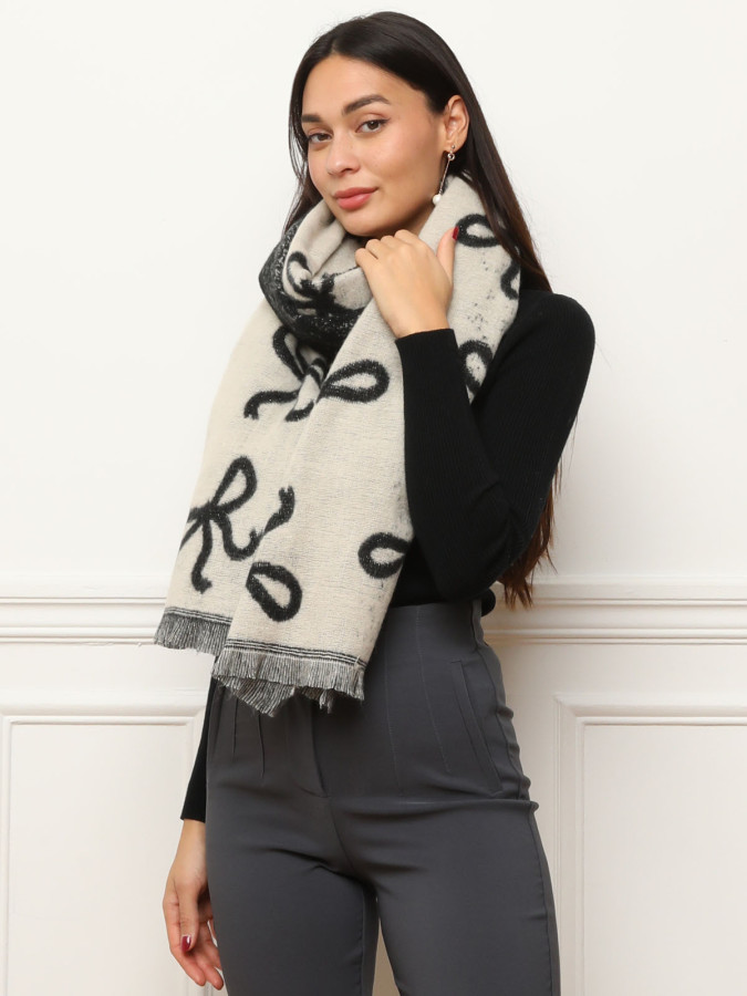 Écharpe duveteuse noire et beige à motif nœuds