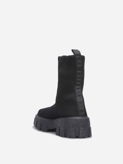 Bottines noires chaussettes à plateforme
