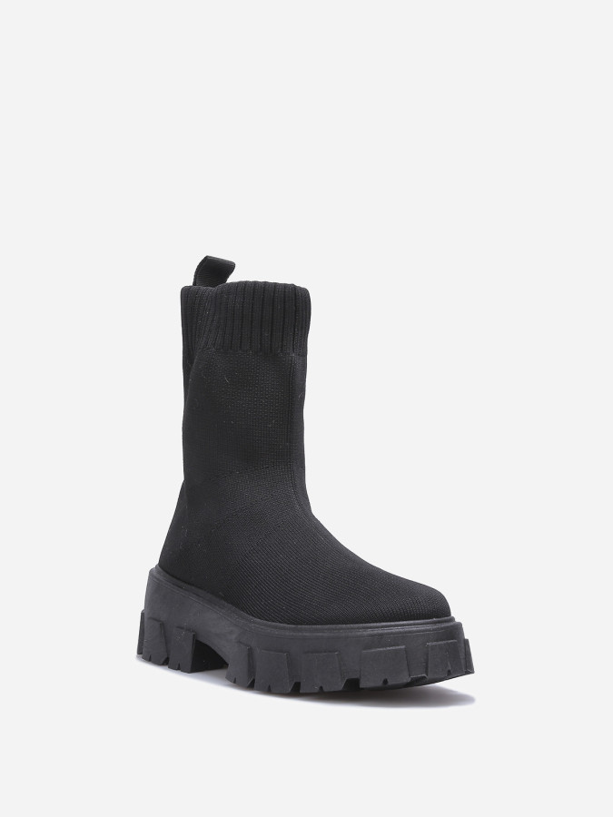 Bottines noires chaussettes à plateforme