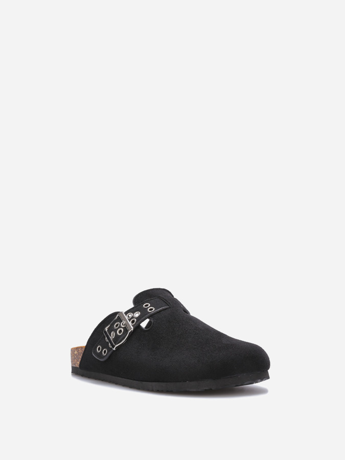 Mules en suédine à bride et boucle noires