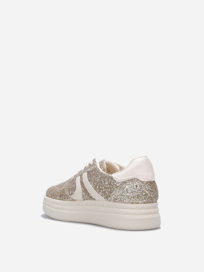Baskets multi-matières à paillettes dorées